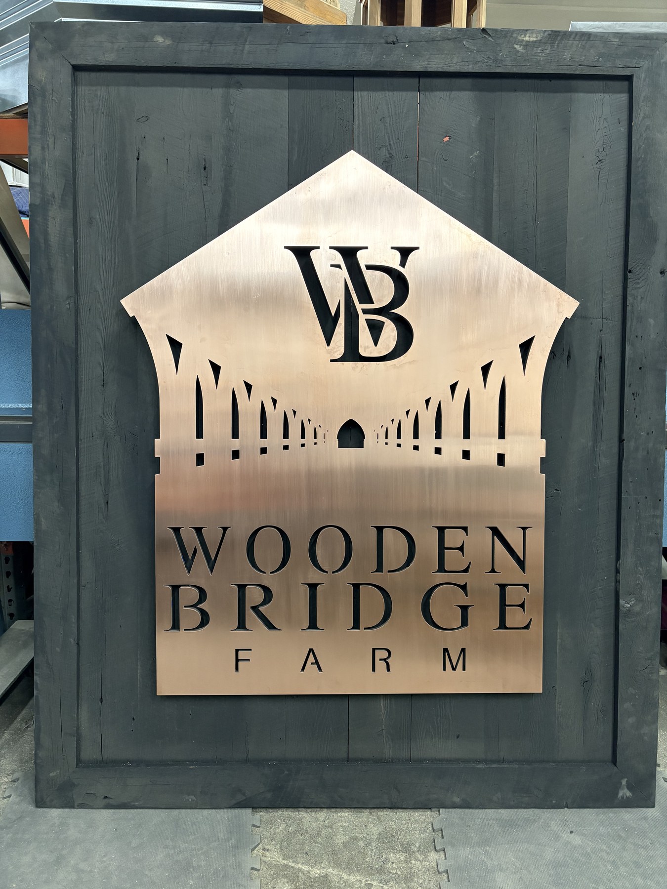 Finished Wooden Bridge Farm architectural sign cut from metal